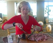 Miriam slicing the beef.jpg